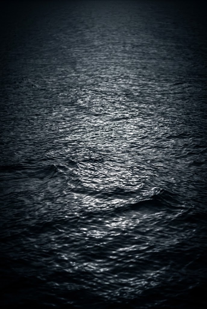 Glimmering dark night ocean surface mar wallpaper aesthetic